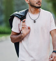 Man wearing sports necklace